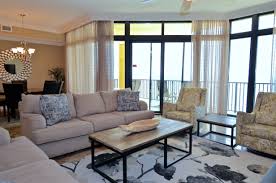 At Phoenix West Ii 1708 In Orange Beach Alabama You Can T Help But Let Out A Sigh And Let Your Worries Go Floor To Ceiling Windows Travertine Tile Home Decor