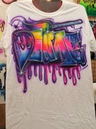 Airbrush Spray Paint Graffiti Name Letter Design On White T Shirt Hand Paint Urban Fashion Artwork Urbanfa Graffiti Names Airbrush T Shirts Airbrush Shirts
