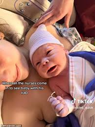 20-year-old woman claims her baby came out holding her IUD