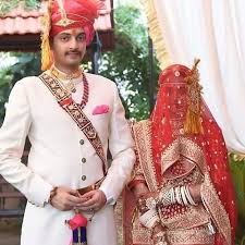 In indian communities, it is customary for the bridegroom to travel to the wedding venue (often the bride's house) on a mare, accompanied by his family members. Image May Contain One Or More People And People Standing Indian Bridal Fashion Indian Bridal Dress Wedding Dresses Men Indian