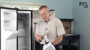 At the top of the ice maker is a white tab, press that downward & pull the unit toward yourself to remove. Ge Refrigerator Repair How To Replace The Ice Maker Youtube