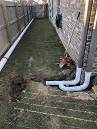 From the gully the rainwater flows down the pipe into the french drain and soaks into the soil. My Big Drainage Project The Lawn Forum