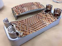 The cold water passes through small plates in direct contact with identical plates through which the hot wort passes through in the opposite direction to create the. New Product Prototype Counterflow Chiller Hardware Brewpi Community