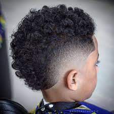 This boy's mohawk haircut for black hair is a mix of an afro and a mohawk. Pin On Kids Hair Cuts