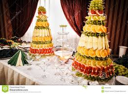 Champagne Fountain And Decorations From Fruit On Table Setting A Fruit Tables Champagne Fountain Fruit Presentation