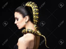 And then for fitting punishment transformed the gorgo's lovely hair to loathsome snakes. ovid, metamorphoses 6. Beautiful Young Woman With Snake On Her Head Like A Hair Brunette Girll With Fashion Make Up And Jewelry Earrings Beauty Close Up Studio Shot Stock Photo Picture And Royalty Free Image
