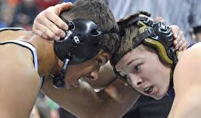 WRESTLING: 'Caring,' colorful Dodgeland junior Ryan Neu has eyes