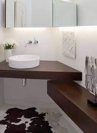 It has a bottom cabinet for storage and a great matching optional corner medicine cabinet. Modern Corner Vanity Google Search Floating Shelves Living Room Bathroom Design Corner Bathroom Vanity