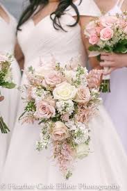 We adore these cascade & long bridal bouquets! Soft Vintage Blush And White Roses In Bridal Bouquet Photo By Heather Cook Elliott Photogr Blush Bouquet Wedding Cascading Bridal Bouquets Bridal Bouquet Pink