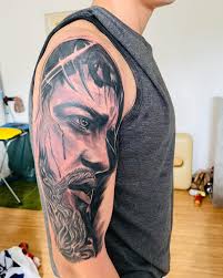 J.L. Tattoo
