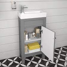 As long as a person is able to take a bath or do his or her business in the toilet without scraping his or her elbows or knees on the walls, your bathroom is sufficient for. Nice Little Free Standing Vanity Works Well In Even The Tiniest Space Cloakroom Vanity Unit Small Bathroom Sinks Small Bathroom Storage