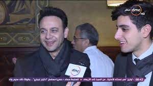 مصطفى قمر، علق على الصورة قائلًا: 8 Ø§Ù„ØµØ¨Ø­ Ø£Ø®Ø¨Ø§Ø± Ø§Ù„ÙÙ† Ù…Ø¹ Ø£ÙŠÙ‡ Ø¬Ù…Ø§Ù„ Ø£ÙˆÙ„ Ø¸Ù‡ÙˆØ± Ù„Ù€ Ø¥Ø¨Ù† Ø§Ù„ÙÙ†Ø§Ù† Ù…ØµØ·ÙÙ‰ Ù‚Ù…Ø± ØªÙŠØ§Ù… Ù…ØµØ·ÙÙ‰ Ù‚Ù…Ø± Youtube