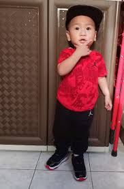 President joe biden speaks to a child as he tours a children's learning center at mchenry county college; My Baby Model My Jordan Baby Cmc S Jordan Nike Shoes Facebook