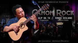 Namun dirinya mengatakan jika dia direkomendasikan sebuah video seorang pemain gitar bernama alif ba ta yang membuatnya penasaran hingga membuka video tersebut. Alip Ba Ta Canon Rock Orchestra Collaboration Youtube