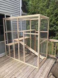 We Made This Over Two Weekends For Franklin He Loves It Outdoor Cat House Cat Cages Cat Enclosure