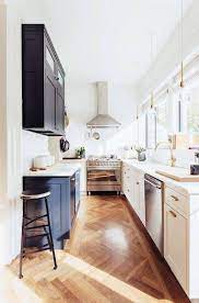 A hallmark of older homes, the compact cook spaces—distinguished by their narrow layout and parallel counters (they were named after the narrow kitchens on ships!)—can actually be quite functional, not to mention beautiful. 6 Small Galley Kitchen Ideas That Are Straight Up Great Kitchen Design Home Kitchens Kitchen Inspirations