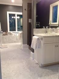 Relative to other natural and engineered stone options, carrara is actually on so if you have fallen in love with carrara marble and are determined to use it as a countertop in your kitchen or bath carrera basket weave floor, gray walls, shaker vanity. Carrera Marble Gray Luxury Tile Carrera Marble Bathrooms Remodel