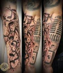 The drum tattoos are perfect to show everyone the relationship you have with the world of music. More Birdcage Mic Ideas Drum Tattoo Tattoos Tattoos For Guys