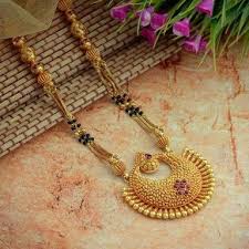 We bet, you'll surely stumble upon a design that will catch your fancy at once. 73 Gold Mangalsutra Pendant Chains Ideas Gold Mangalsutra Gold Jewelry Fashion Gold Jewellery Design