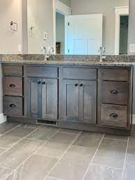 Hickory cabinets with dark wood floors are very visually appealing. Ivory Painted Cabinet Kitchen With Gray Stained Hickory Island In Rural Illinois Country Kitchen Other By Village Home Stores Houzz Au