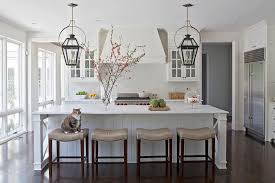 Our bar stools, which are all handcrafted and built to last through years of heavy use, are available in several styles and in many different leather grains. White Kitchen With Taupe Leather Counter Stools Transitional Kitchen