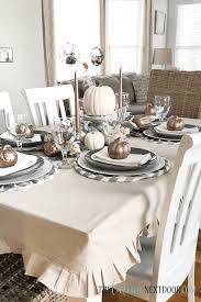 The tablelcoth is finished with an oversized mitered hem. How To Make A Tablecloth Farmhouse Style The Latina Next Door Dining Room Tablecloth Dining Table Cloth Dining Room Cozy