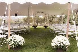 White Wedding Tent With White Folding Chairs Event Tent Rental Event Tent Party Tent Rentals