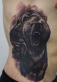 45 Bold Bear Tattoo Designs That Will Inspire You Buzz Hippy Black Bear Tattoo Bear Tattoos Tribal Bear Tattoo
