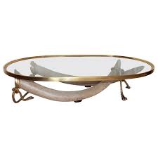Wonderful and impressive faux elephant tusk coffee table in a monumental size. Elephant Tusk Coffee Table 8 For Sale On 1stdibs