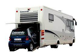 Garagen für wohnmobile, auch caravans genannt, bieten eine sichere verwahrung, bis der nächste urlaub wieder ansteht. Neues Reisemobil Mit Kleinwagen Garage Magazin