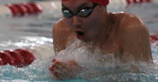 SWIMMING: Red Devils sink Cubs
