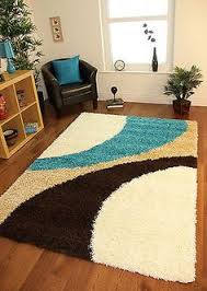 It features a low pile for easy walking and a gorgeous allover tribal diamond pattern in contrasting shades of blue and white. 48 Best Shaggy Rug Ideas Shaggy Rug Rugs Diy Rug
