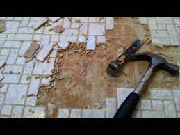 How to remove stains from mosaic tiles? How To Remove Floor Tile With A Hammer And Chisel Youtube