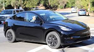 Tesla Model Y In Black Paparazzied Outside The Tesla Hq In Palo Alto Ca Tesla Model Tesla Hot Rods Cars Muscle