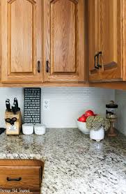 We covered everything in the kitchen with disposable drop cloths and painters tape before as for the countertop kit itself, it was really easy to use and made a drastic improvement in the kitchen. How To Paint A Kitchen Tile Backsplash And Update Your Kitchen For Less Average But Inspired
