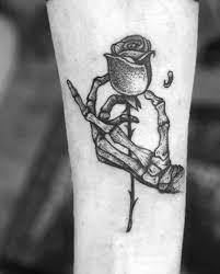 Find the perfect hand holding rose stock illustrations from getty images. All Of The Skeleton Hand Holding Rose Tattoo Meaning