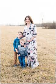 Family And Maternity Session Romantic Maternity Session With Floral Dress Floral Dress In Whea Romantic Maternity Photos Family Maternity Maternity Portraits