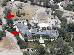 In 2017, curbed los angeles reported that the jenner matriarch purchased a mansion in hidden hills across the street from kim and kanye. Kim Kardashian And Kanye West Hire Private Firefighters Save Neighbors From Wildfires