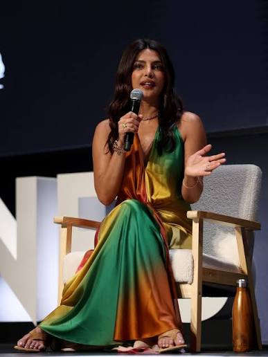 Priyanka Chopra Jonas (@priyankachopra) brought a bold splash of colour to Cannes Lions (@cannes_lions) 2026, stepping out in a striking satin halter gown awash in rich sunset-inspired hues. The actor-producer, who has