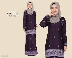 This new style of baju kurung is known as baju kain dagang, also known as samping is a type of sarong cloths used as a veil when outdoor. Kurung Moden Songket Sari