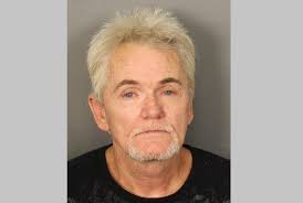 Father, 59, accused of shooting son in fight over money