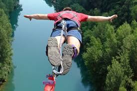 Bungee jumping, sport in which the jumper falls from a high place with a rubber (bungee) cord attached both to his or her feet and to the jump site, and, after a period of headfirst free fall, is bounced partway back when the cord rebounds from its maximum stretch. Afs Flugagentur Nurnberg Bungee Jumping