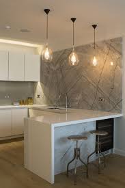 Naturally colourful and beautiful, they make the perfect a marble worktop or countertop in your kitchen or home will add a natural touch and warmth, inviting family and friends to gather around its aesthetically pleasing surface. Handleless Kitchen White Recon Stone Worktop Grey Marble Splash Back Breakfast Bar C Handleless Kitchen White Kitchen Paint White Kitchen Marble Backsplash