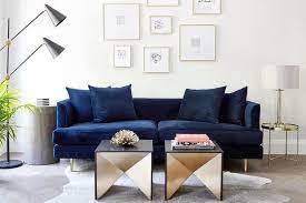Beautifully Designed Contemporary Living Room Features An Art Gallery Mounted Above A Blue Velvet Velvet Living Room Grey Couch Living Room Living Room Leather