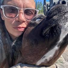 How to prevent backdraft and smoke when starting a wood stove fire?