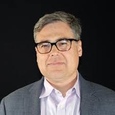 How does student-teacher matching affect suspensions for students of color?