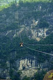 Don T Look Down This Terrifying Zip Line Stretching 400metres Above The Valley Floor Is The Only Connection To The O Ziplining Take The High Road Scary Places