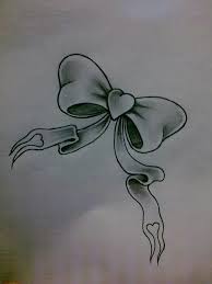 The bow tattoo design below is an intricate piece of artwork that looks spectacular on the wearer. Pin By Lhda On Bow Tattoos Bow Tattoo Designs Lace Bow Tattoos Bow Tattoo