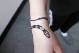 Dec 04, 2017 · in its original and most common variation, it depicts a snake eating its own tail in a closed circle. Wrap Around Snake Tattoo On Wrist Novocom Top