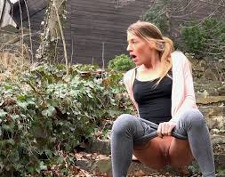 Nice sporty slender girl pulls down her grey yoga pants and pisses -  Mylust.com Video